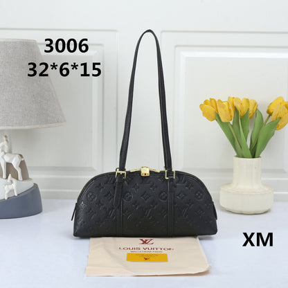 Elegant Dome Shoulder Bag – Monogram Embossed