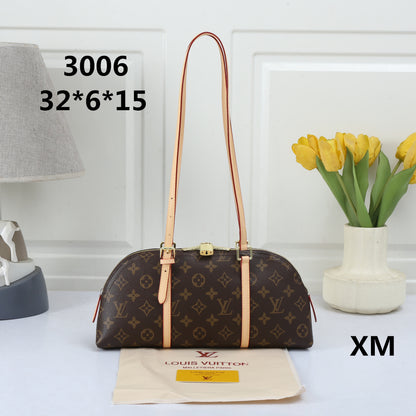 Elegant Dome Shoulder Bag – Monogram Embossed