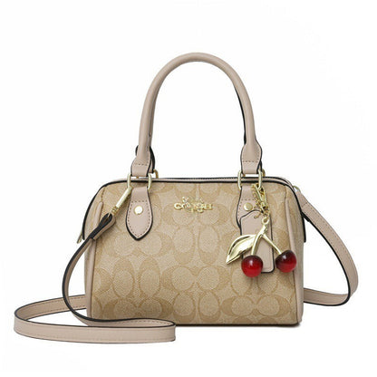 Mini Rowan Crossbody Bag In Signature Canvas